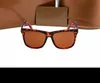 2021 Hot Designer Sunglasses Brand 0057 نظارات في الهواء الطلق على رف PC Classic Men and Women's Luxury Sungrases