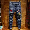 Erkek Kot Moda Erkek Hip Hop Rahat Yırtık Sıkıntılı Skinny Denim Pantolon Küçük Düz Boya Sıçramasına Delik
