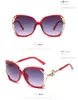 Mode lunettes de soleil femmes hommes lunettes de soleil noir Vintage oeil de chat pour dame or UV400 2021 vente en gros