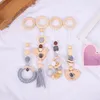 4 Pcs/Set Baby Gym Frame Stroller Hanging Pendants Wooden Ring Teether Molar Teething Nursing Rattle Toys Infant Room Decoration 2500 Q2