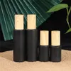 5g 10g 15g 20g 30g 50g 60g 80g 100g Black Frosted Glass Cream Bottle Cosmetic Lotion Spray Pump Bottles Empty Refillable Jars Container with Wood Grain Plastic Caps