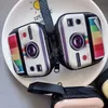 New creative tinplate coin purse mini key case retro record tape luggage pattern earphone coin storage bag DAR1653157287