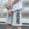 反射文字プリントのショートパンツ2021夏の韓国のファッショントレンドヒップホップストリートウェア十代の若者たちのストレートレッグバスケットボールパンツx0705