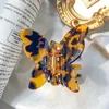 Clips de cheveux Barrettes accessoires de papillon coréen acrylique pour femmes coloré metal metal simple cadeaux entièrement 252k