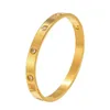 Donna Uomo Bracciale in oro Bracciale con ciondoli Gioielli firmati Moda unisex Fibbia in acciaio inossidabile Nessuna vite Chiodo Vacanze stagionali Bracciali con diamanti placcati oro 18 carati