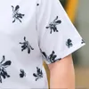 Übergroße Hemden Männer trendy und Blumen kurzärmelig Hemd Casual Button Up Bluse hochwertige Streetwear Camisa Maskulina Herren