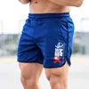 Nowa moda męska sportowa spodenki bodybuilding spodnie fitness krótkie jogging prędkość sucha dorywcza siłownia męskie szorty H1206