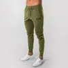 Nuovi pantaloni da jogging da corsa Pantaloni da jogging da bodybuilding in cotone morbido da uomo Pantaloni lunghi Harem Pantaloni da allenamento sportivi da fitness