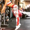 Wysoka talia Czerwone legginsy dla damskie fitness seksowny list drukowany siłownia sport trening pchnięcie kobiece legginsy 211204