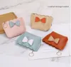 Porte-monnaie créatif en PVC, petit sac à clés Bowknot Lady, portefeuilles de poche KeychainCase Pack, sac de rangement pour câble de données pour écouteurs