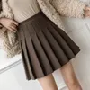 Kjolar brun pläterad kort kjol kvinnlig vår och höst koreansk mode kostym en linje sexig hög midja mini slim mujer