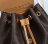 Montsouris bb ryggsäck elegant brev prägling äkta kohud läder duk spänne satchel handväska axelväska mode pochette 185v