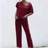 Vår sommar jumpsuits kvinnor v nacke bodysuits fasta fickor jumpsuit stråle fötter streetwear bandage rompers overall två paj 210508