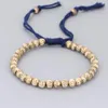 Braccialetti con ciondoli Buddista tibetano regolabile Filo di cotone intrecciato a mano Perline di rame Bracciale con nodi fortunati Gioielli da donna in ottone