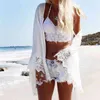 Sexig strand omslag upp vit virka spets tunika kvinnor bikini pareo täcker kläder bära baddräkt tryckt klänning badkläder 210629