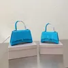 Bolsas de cosméticos Casos Mulheres Bolsas de designer de luxo Card Titular de cartões de alta qualidade bolsa de couro genuíno boby boby bolsas de moda Moda