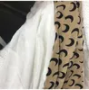 2021 Women's Knits pizzo manica lunga a maniche lunghe maglioni openwork sottile maglia jacquard all-match t-shirt da sole