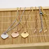 Hängsmycken rostfritt stål designer halsband hjärta hänge korta kvinnliga smycken 18k guld titan Peach Arts Supplies for Gift3002575
