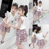 Gooporson Été Mignon Petites Filles Vêtements Mode Coréenne Bow Tie Glands Broderie Manches Volantes Shirtflower Shorts Tenues 210715