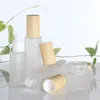 60 ml 100 ml 20 ml 30 ml 40 ml 80 ml 50 ml Pot de crème de gel avec couvercles en bois Capuchon de lotion en verre givré Bouteille de pulvérisation Conteneur cosmétique 2842 Q2