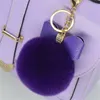 Pompon da donna Bigiotteria in pelle Bow c Charm Pompon Portachiavi Fluffy Faux Fur Ball Portachiavi per borsa da auto 2021