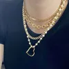 collana di perle e catena