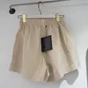 Pantalones cortos de cintura elástica con costuras de encaje de verano para mujer, Mini pantalones cortos holgados Spodenki Damskie para mujer, moda informal femenina