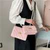 Bolso de compras para mujer, producto más vendido, informal, versátil, a la moda, con textura de cadena de perlas, espalda del día, novedad de 2021