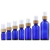 5 ~ 100 ml glazen mist spray fles amber blauwgroen hervulbare lege cosmetische container parfum spuitfles met hout bamboe cap