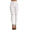 Europeiska och amerikanska förfallna jeans leggings kvinnor avslappnad solid färg hög midja täta penna byxor 12779 210508