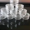 1000pcs 5ML Recipiente de amostra cosmética de plástico transparente 5g Jar Pot pequeno vazio acampamento viagem sombra creme facial bálsamo labial 5ml / pcs frascos de garrafa separados com DHL