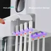 Portaspazzolino magnetico multifunzione con tazze Accessori da bagno Set Dispenser automatico di dentifricio Spremiagrumi 210322