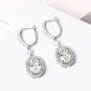 Splendidi orecchini pendenti color argento per donna Gioielli bianchi Orecchini pendenti in cristallo Accessori per gioielli da sposa
