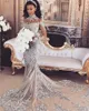 Sparkly 2022 Mermaid Wedding Dress Sexig Sheer Bling Pärlor Spets Applique High Neck Illusion Långärmad Champagne Trumpet Brudklänningar