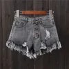 Pantaloncini di jeans a vita alta sexy femminili coreani BF Summer Wind Pantaloni jeans larghi con foro svasato indossati dalle donne 210719