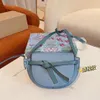 Bolso de diseñador de lujo Bolso Bolso de hombro Cosido en silla de montar Cinturón de cuero anudado y pasador de metal con pestillo lateral Color sólido Con caja