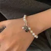 Braccialetto da donna di lusso semplice e leggero Dign 925 argento sterling nero amore perla naturale