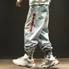 Mäns Jeans Män Street Fashion Broderi Svart Loose Board Denim Byxor Övergripande Male Rap Dance Hop Hip Overaller