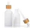 Frostat Amber White Glass Dropper Bottle 15ml 30ml 50ml med bambu keps 1oz Trä eteriska oljflaskor