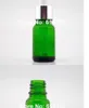 Przyjazd 10 ml zielone butelki szklane Pusta butelka kroplomierza, 10CC olejku eterycznego Małe próbki fiolki biała guma