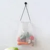 Förvaringslådor fack multifunktionella väggmonterade köksfrukt och grönsaks hängande väska bärbar ingefära vitlök lök ihålig nät