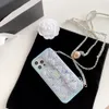 デザイナー電話ケースモバイルハンドセットバッグ高品質のファッションカシミアハード携帯iPhoneケーススマートフォン調整可能なセルレアガスシオ