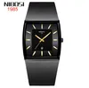 Nibosi Fashion Style Студенты смотрят календарь Quartz Mens Watches Сетчики из нержавеющей стали.