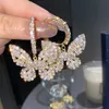 Glänsande Zirconia Charm Kvinnor Örhängen Enkel stil Elegant Butterfly Pendant S925 Personlighet Hollå Örhängen