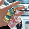 Keychains Bubble Keychain kreativer Milch Tee Tasse Flüssigkeit Kristall Quicksand Pendel Schlüsselringbeutel Anhänger für Frauen Schlüsselkette 4314717