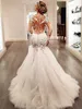 2021 Abiti da sposa vintage a sirena maniche lunghe applicazioni in pizzo abiti da sposa con perline abiti da sposa gioiello con strascico