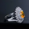 Высококачественный микро круглый кубический цирконий Камень Установка роскошных больших женщин Обручальное кольцо с желтым кристаллом R021 210714