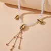 Charmant collier ras du cou en chaîne de perles pour femmes, coquille d'été, longue chaîne en alliage d'or en métal réglable, bijoux cadeau