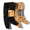 Pantalones de hip hop hombres 2020 nueva moda casual algodón costura color joggers pantalones bolsillo streetwear pantalones hombre 4xl y0927