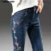elastische Whitening-Stickerei-Blume-Nationalwind-Mikrohorn-Jeans große Größe war dünne Taillenhose für Frauen 210608